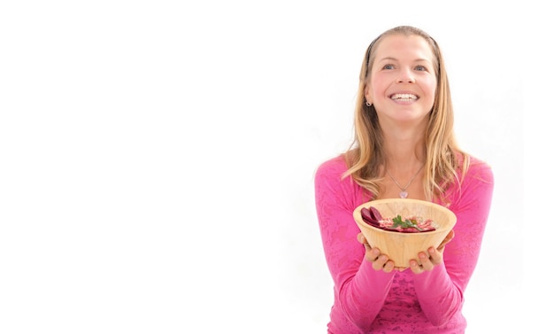 Uśmiechnięta osoba jedząca posiłek